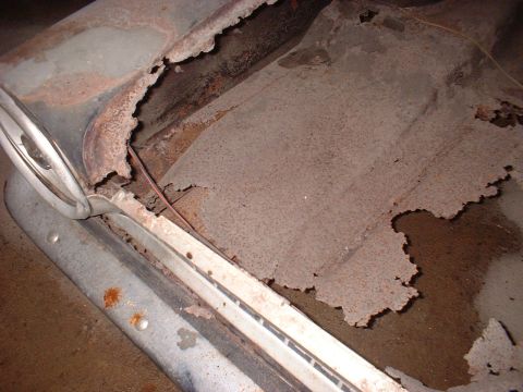 1963 Ford Galaxie - The floor pan of this vehicle is severely corroded and shows significant deterioration.