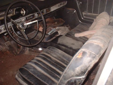 1963 Ford Galaxie - Interior view of a 1963 Ford Galaxie, showing the dashboard and seats.