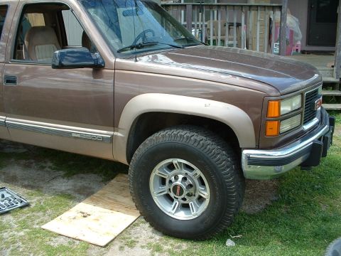 1994 GMC Suburban - Stock center caps did not fit without modification. Just was just a friction fit to see what it would look like.