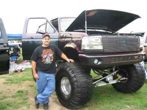 1986 Ford Bronco - This modified pickup truck appears to be from the early to mid-1990s, not a 1986 model.