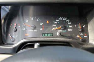 1996 Ford Bronco - The odometer shows 18,394 miles on this vehicle's dashboard.