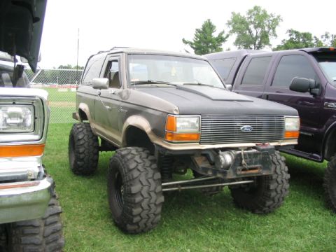 1986 Ford Bronco - Modified 1986 Ford Bronco on display at the Essex Junction Truck Show, oversized tires and a lifted suspension.