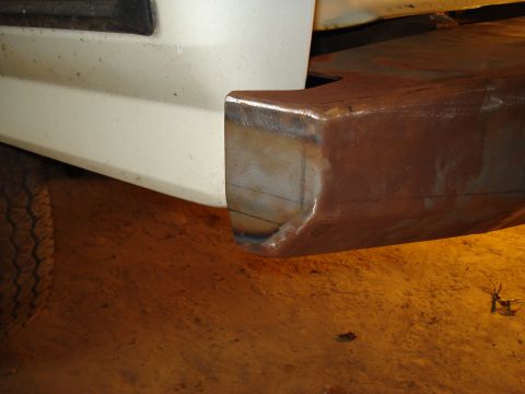 1991 Ford Bronco - A custom-fabricated bumper is shown attached to the rear corner of a vehicle.