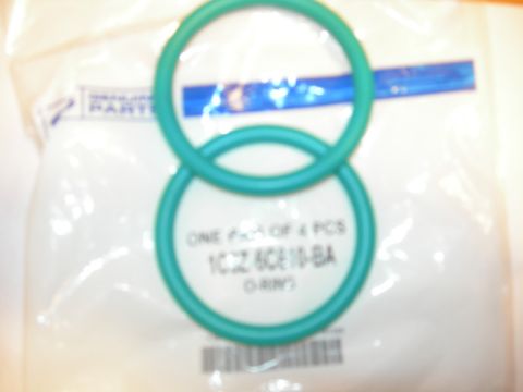1984 Ford Bronco - A package contains two teal o-rings, part number 1CZ6CE10-BA, with text indicating a pack of 4 pieces.