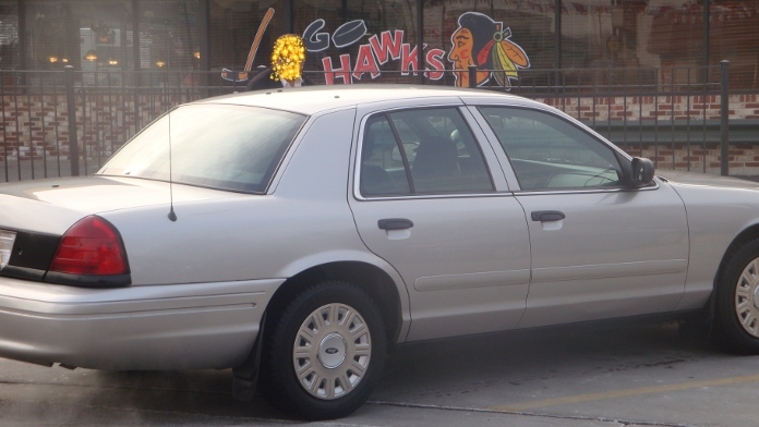 Silver sedan, rear-side view, parked on pavement. "SUPERMOTORS.NET" watermark visible