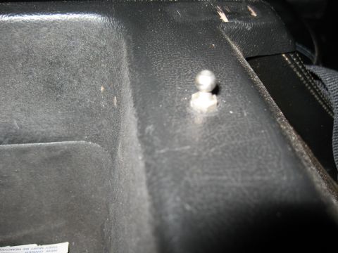 1968 Shelby GT500 - Interior plastic trim with a ball stud fastener. A sticker reads 'NEW OWNER THEY MUST BE REMOVED'.