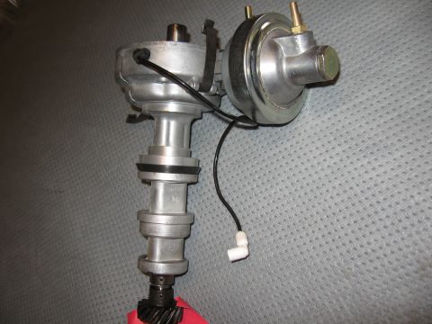 1968 Shelby GT500 - An automotive distributor part is shown against a textured gray background.