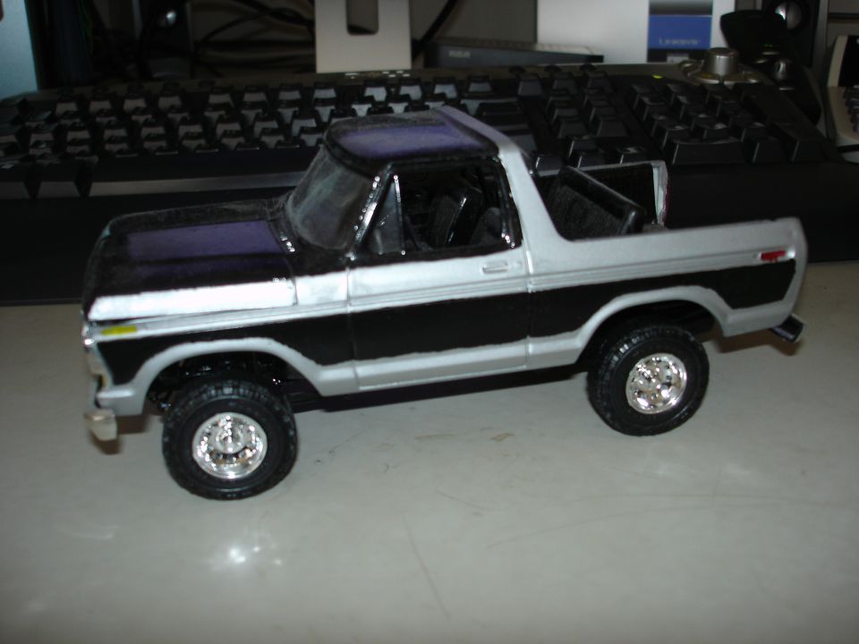 Model of a 1978 Ford Bronco, black and silver two-tone paint