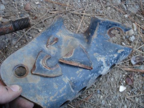 1993 Ford Bronco - One of the brackets was broken, the bolt was holding the pieces in place.
