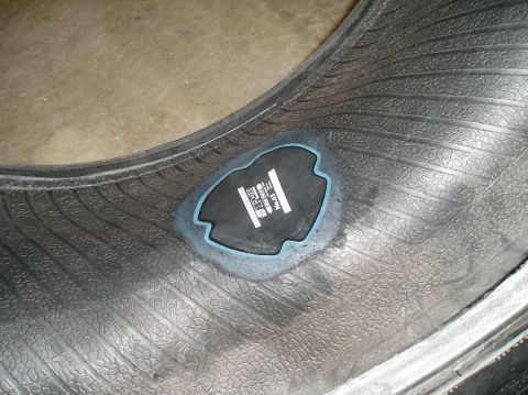 1986 Toyota Hilux - A close-up view of a tire patch applied to the inner surface of a tire.