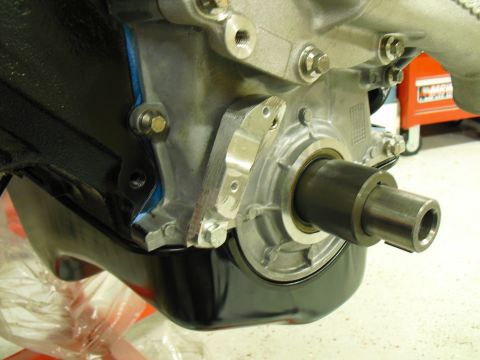 1996 Ford Bronco - Close-up view of an engine's crankshaft seal and housing.