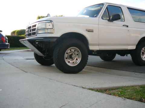 1988 Ford Bronco - 1988 Ford Bronco with a custom front bumper and off-road tires.