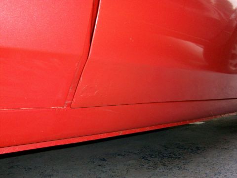 1973 Ford Ranchero - the paint was bubbling on both doors, near the bottom, so we'll grind off the paint to see how much rust is hiding.