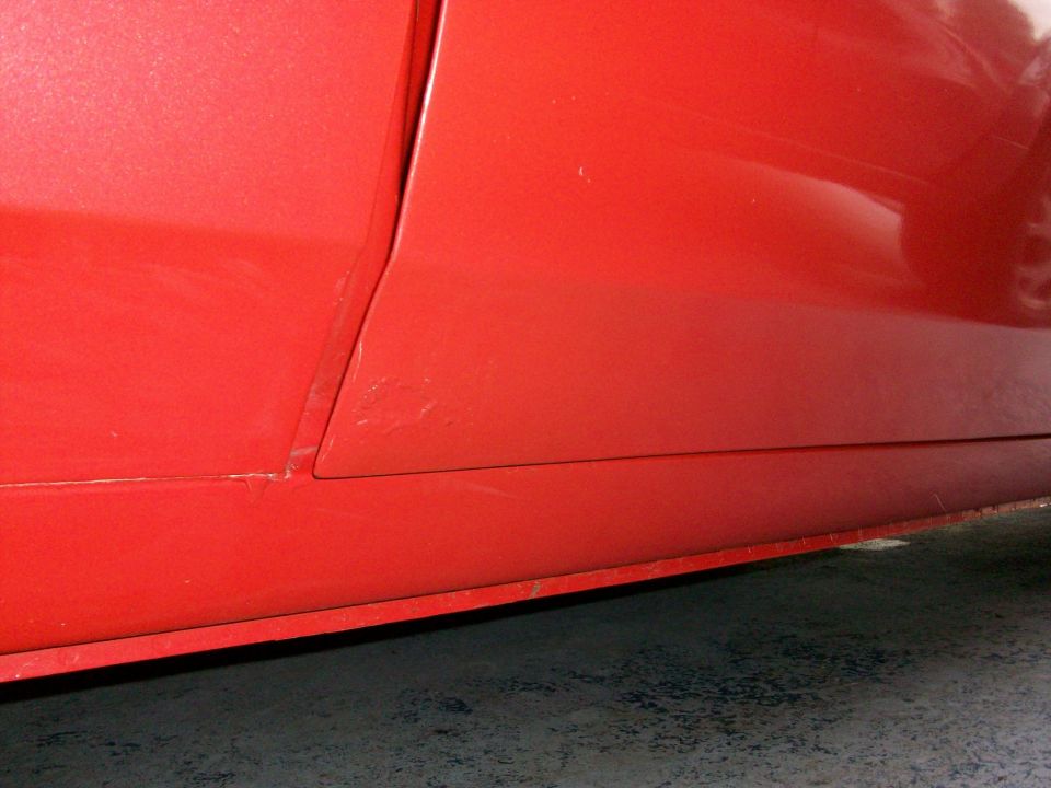 the paint was bubbling on both doors, near the bottom, so we'll grind off the paint to see how much rust is hiding.