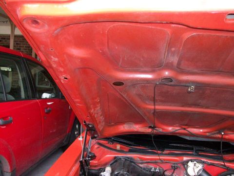 1973 Ford Ranchero - it looks like someone tried to "glue" the under-hood insulation in place; we'll clean it off and repaint the bottome of the hood.