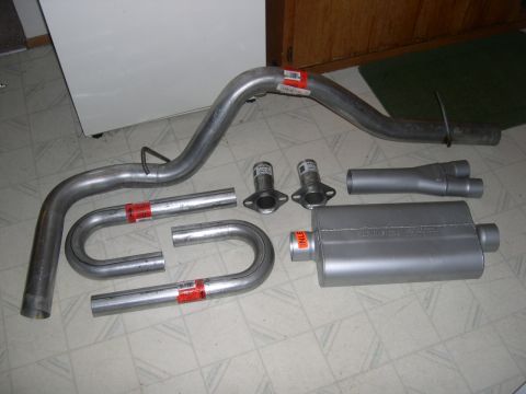 1986 Ford Bronco - New shiny stuff, Flowmaster 50 series, 3" dynomax tailpipe. Not pictured is a Walker 3" high flow cat.