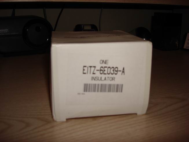Cardboard box with part number E1TZ-6E039-A and the word INSULATOR