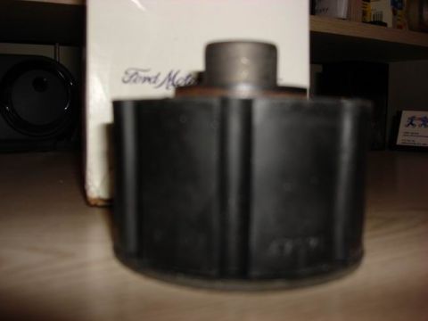 1984 Ford Bronco - A Ford Motor Company branded part is shown in detail, likely a component for a vehicle.
