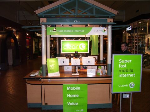 1991 Ford Bronco - A retail kiosk displays Clear brand mobile internet devices and promotional signage.