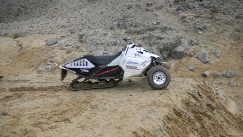 1997 Ford Ranger - ATV modified with tracks for off-road terrain.