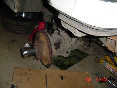 1987 Ford Bronco - This side is together except for steering...'80 outer axle shaft, spindle, rotor, hub, '85 dust cover, '87 knuckle, caliper, '89 locking hu…