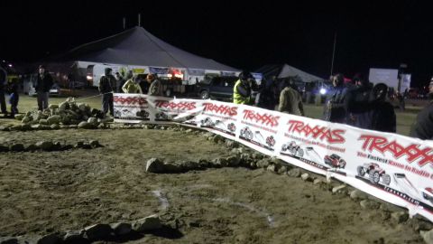 1997 Ford Ranger - A large Traxxas banner is displayed at an outdoor event at night.
