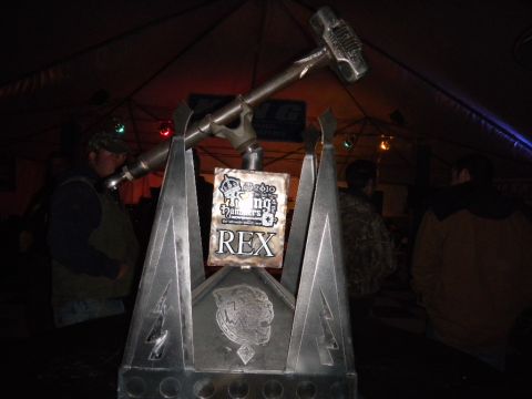 1997 Ford Ranger - A trophy with a hammer is displayed indoors, with people gathered around.