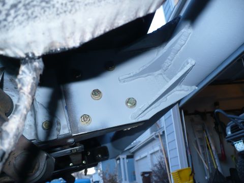 1979 Ford Bronco - Underside view of vehicle frame components, likely during restoration or repair work.