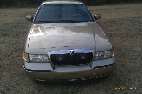 2000 Mercury Grand Marquis - Front view of a 2000 Mercury Grand Marquis parked outdoors.