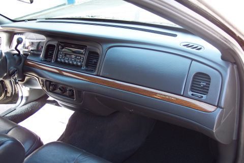 2001 Ford Crown Victoria - Interior view of a 2001 Ford Crown Victoria, showing the dashboard and center console.