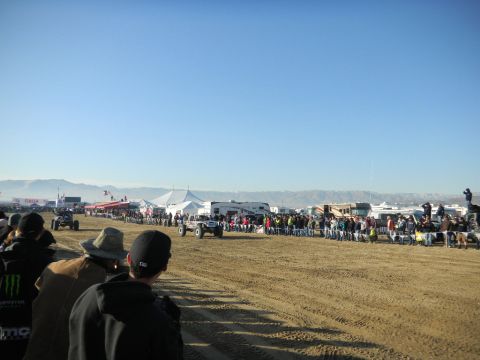 1997 Ford Ranger - A crowd watches off-road vehicles compete in a desert race event.