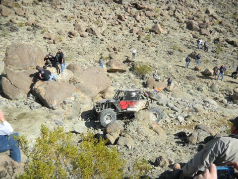 1997 Ford Ranger - An extreme off-road buggy navigates a steep, rocky incline during a race event.