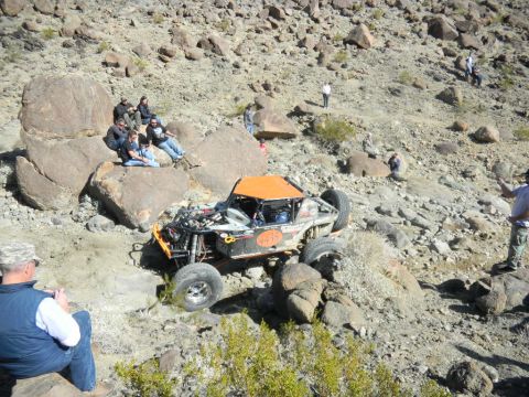 1997 Ford Ranger - A custom off-road buggy navigates a challenging rocky course during a race event.