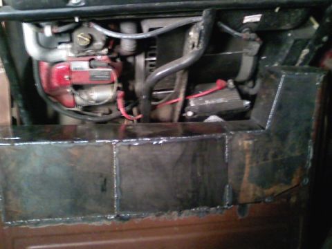 1990 Ford Bronco - Custom metalwork is visible in the engine bay, obscuring the original vehicle components.