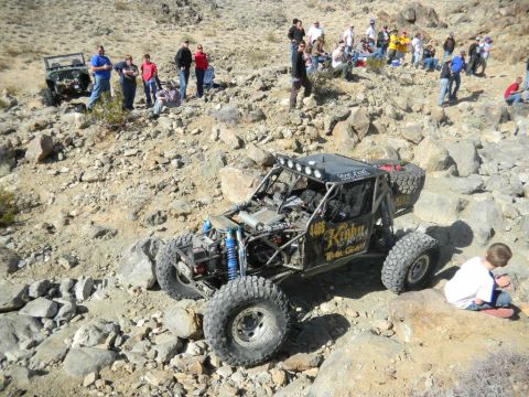 1997 Ford Ranger - Spectators gather to watch a custom off-road buggy navigate a rocky trail.