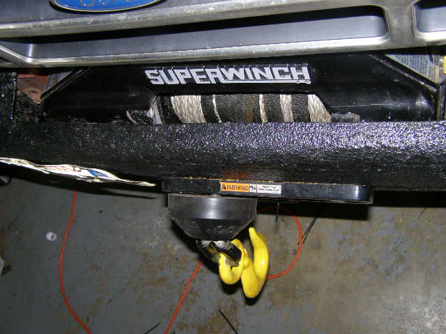 Front bumper with Superwinch electric winch and yellow tow hook