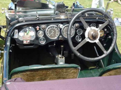 1969 MINI Cooper - Interior view of a classic car's dashboard and steering wheel, with a visible watermark.