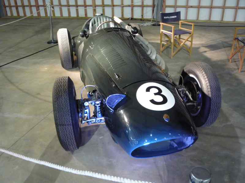 Dark blue racing car with white number 3 on front