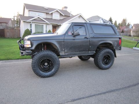 1996 Ford Bronco - This modified Ford Bronco sits high on its suspension, ready for adventure.