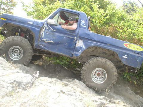 1979 Ford Bronco - This 1979 Ford Bronco is navigating a rocky trail with a driver behind the wheel.