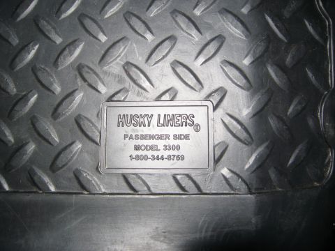 1986 Ford Bronco - Close-up of a Husky Liners floor mat, passenger side, model 3300.