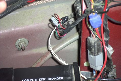 1997 Ford Taurus - Close-up of vehicle wiring and a compact disc changer, with a watermark visible.
