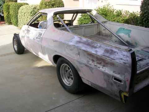 1972 Ford Ranchero - This 1972 Ford Ranchero is undergoing restoration, showing its bare metal body and interior roll cage.