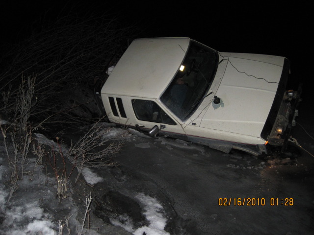 1990 Ford F-250 pickup truck at night