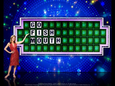 1971 Ford Ranchero - A game show host stands beside a puzzle board on the Wheel of Fortune.