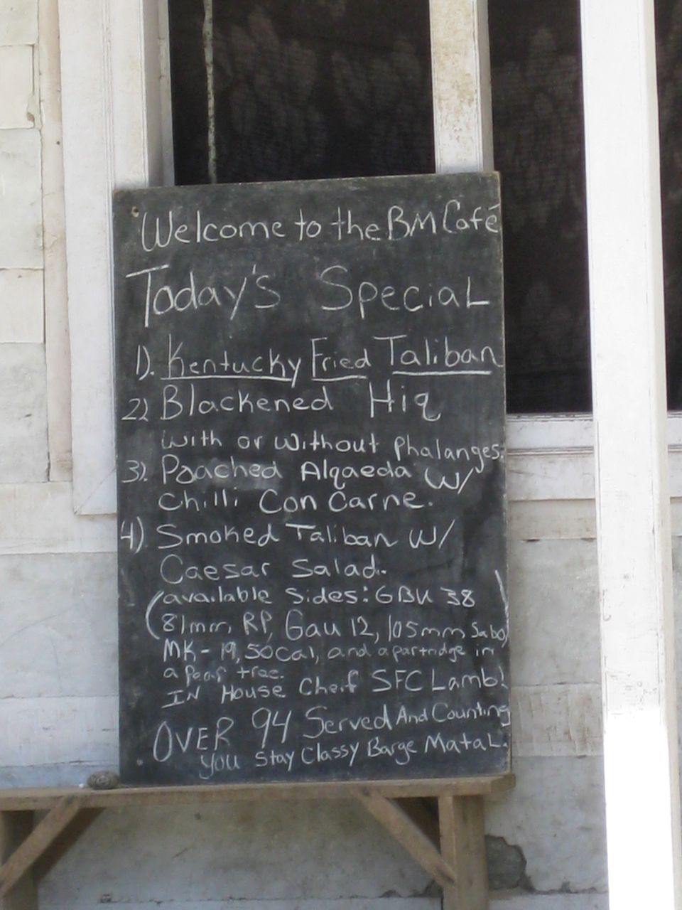 Handwritten chalkboard cafe menu with humorous specials
