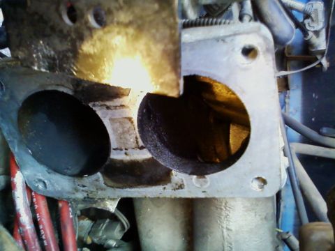 1994 Ford F-250 - There was liquid in my intake manifold causing my F250 to hesitate around turns when it would spill into my intake.