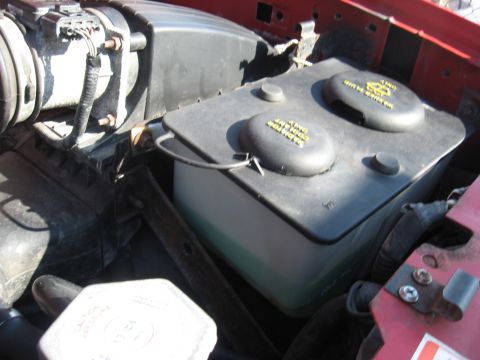 1996 Ford Bronco - New solvent pump and nozzle, cleaned out tank full of mud