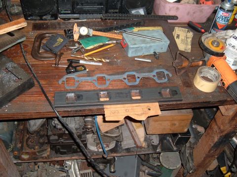 1981 Ford LTD - Gasket on top, finished ports in the middle. The cardboard on the bottom has the port layout from my head on it. I held it to the head with…