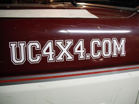 1991 Ford Bronco - A close-up view of a vehicle's side panel displays a prominent "UC4X4.COM" decal.